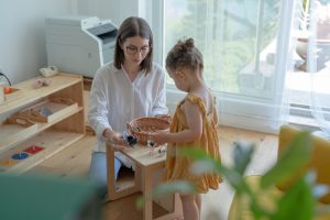Behavioral analyst working with child